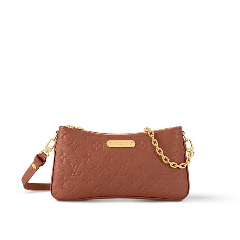 liv pochette monogram empreinte